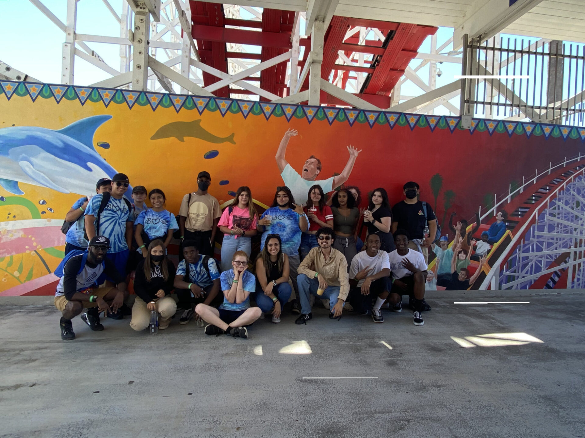 Students in front of mural