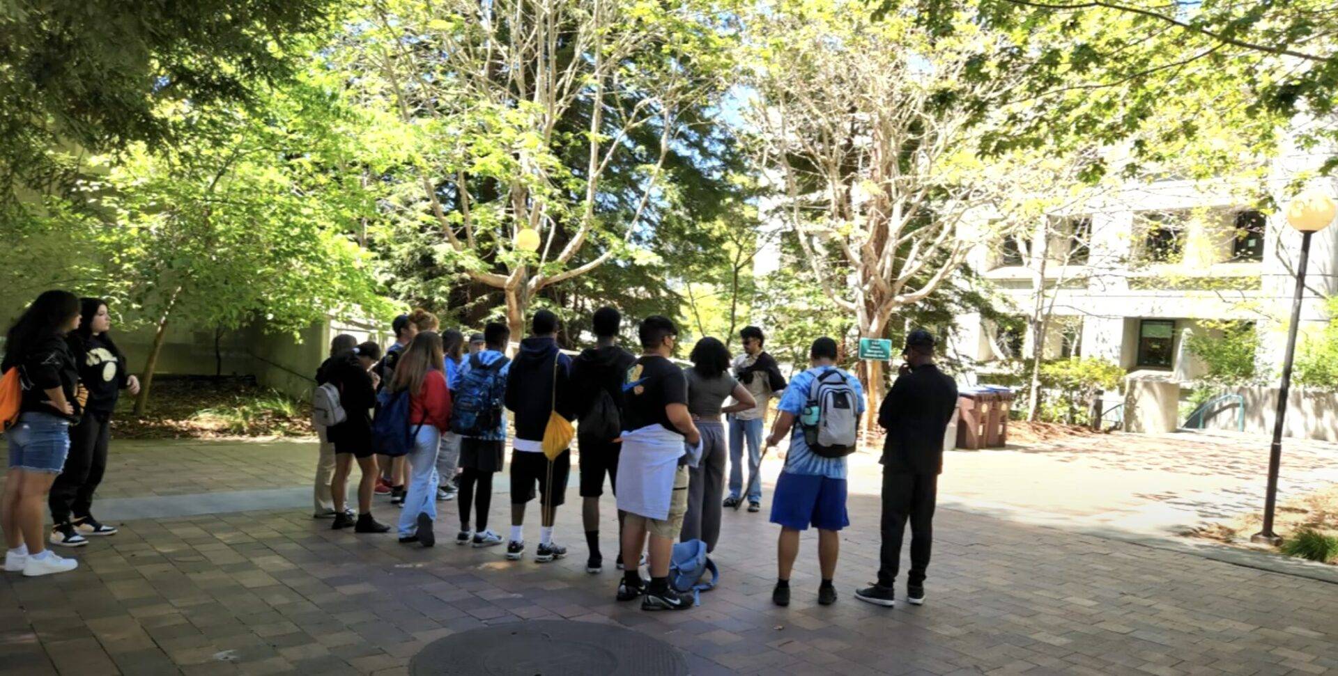 PACT Upward Bound Summer Academy 2022 students on college campus tour